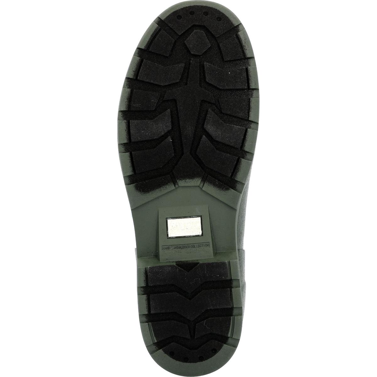 Nahaufnahme einer robusten, tief profilierten Gummilaufsohle eines Muck-Boots.
