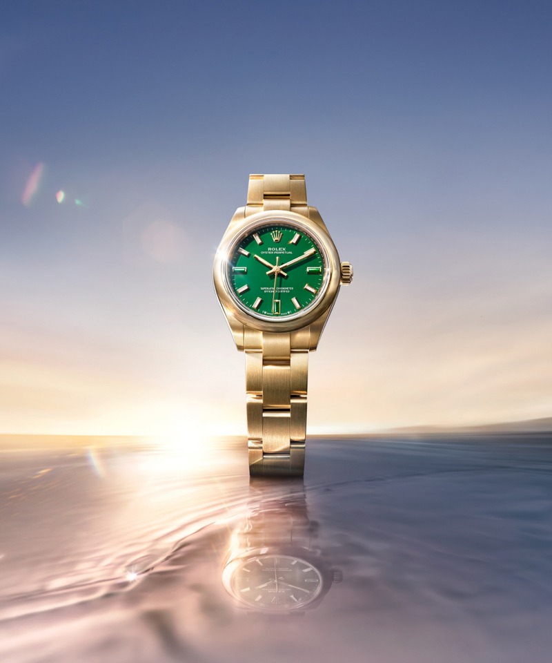 Rolex Oyster Perpetual 28 in Gelbgold mit grünem Zifferblatt