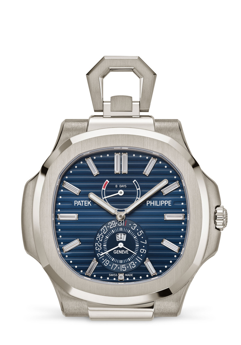 Patek Philippe Nautilus-Tischuhr Ref. 958G-001 von 2026 aus Weißgold mit blauem Zifferblatt und charakteristischer achteckiger Lünette. BU: Die Nautilus für den Schreibtisch: Zum 50. Jubiläum überträgt Patek Philippe den ikonischen Entwurf erstmals auf eine Tischuhr aus Weißgold mit Acht-Tage-Werk. Die Edition ist auf 100 Exemplare limitiert. Credit: